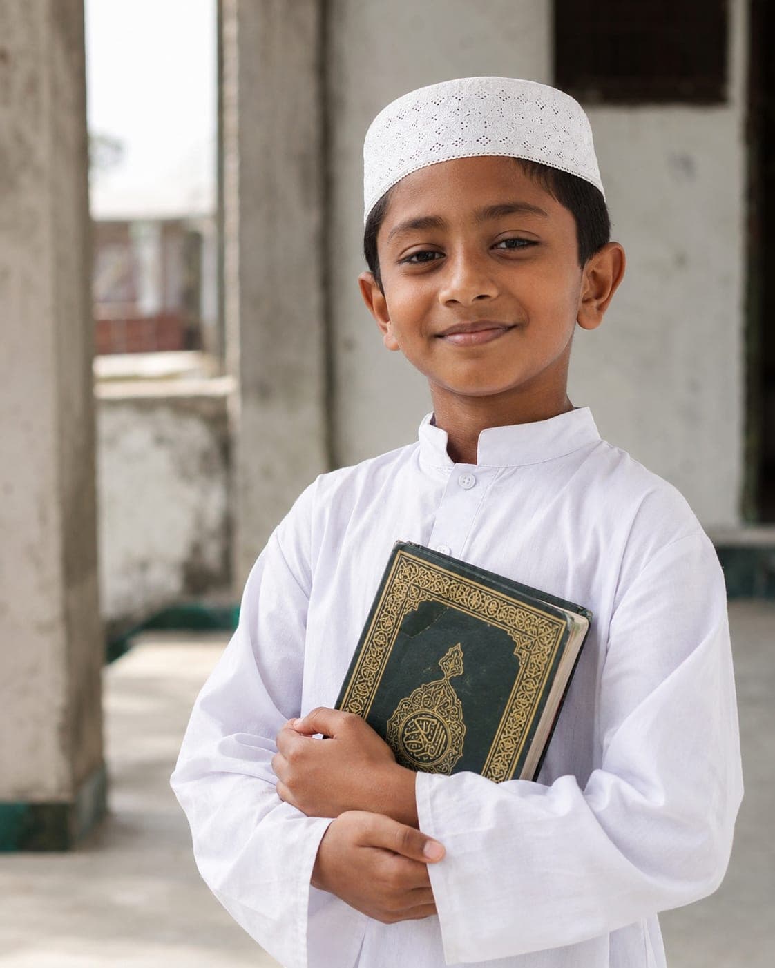 A child reading a letter from their sponsor