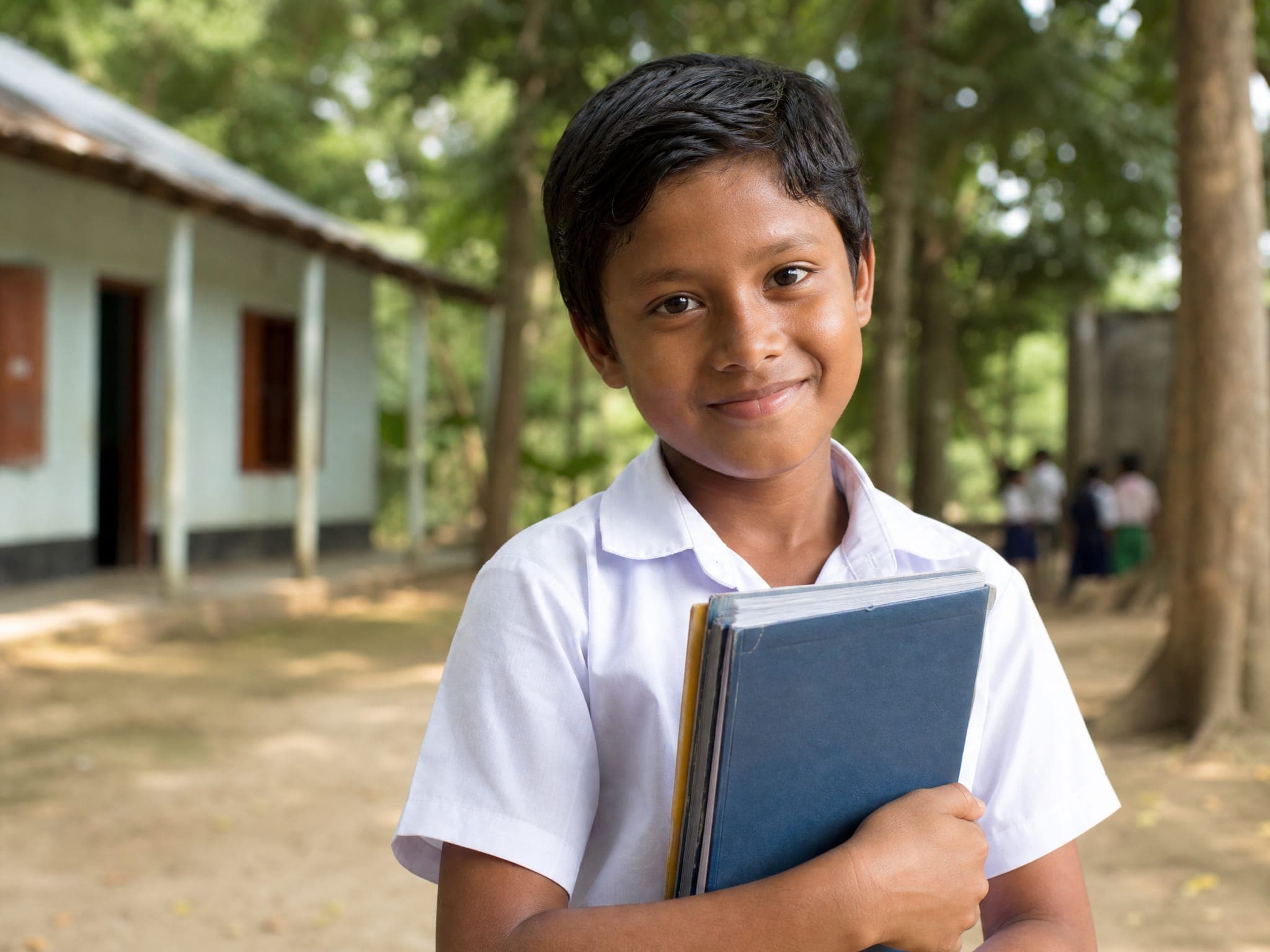 Field worker with a child during a verification visit